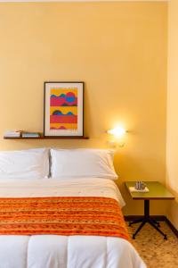 A bed or beds in a room at Residence Sabrina