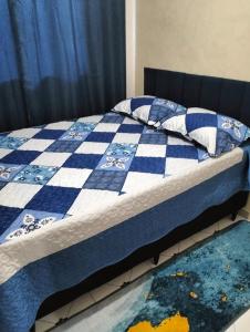 Postel nebo postele na pokoji v ubytování Casa aconchegante para hóspedes ao lado da 466 e Cidade dos Lagos