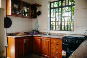 Kuchyň nebo kuchyňský kout v ubytování Mama Ket Homes Apartment + 86 fotografií