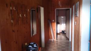 a hallway in a house with wooden walls at Holiday Home Paul in Blace +36 photos