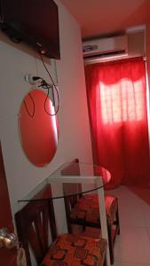 TV a/nebo společenská místnost v ubytování Hotel Rumbo al Sol