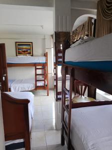Postel nebo postele na pokoji v ubytování Hotel Rumbo al Sol + 29 fotografií
