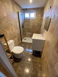 Ένα μπάνιο στο Petite maison chaleureuse