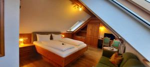Postel nebo postele na pokoji v ubytování Hotel Gasthof Jägerhaus
