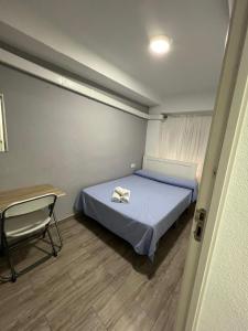 Postel nebo postele na pokoji v ubytování Guesthouse Central