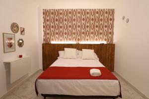 Postel nebo postele na pokoji v ubytování Hotel Posada del Mar Playa de Gandía