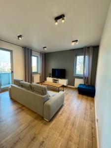 Televízia a/alebo spoločenská miestnosť v ubytovaní JTB Nautica Aparthotel