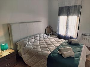 Ένα ή περισσότερα κρεβάτια σε δωμάτιο στο El Akito apartamento II