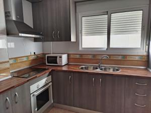 Η κουζίνα ή μικρή κουζίνα στο El Akito apartamento II