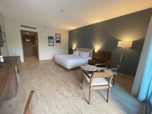 Postel nebo postele na pokoji v ubytování Phoenix Hotel & Wellness