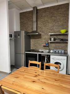 Kuchyňa alebo kuchynka v ubytovaní Habitaciones La MAR