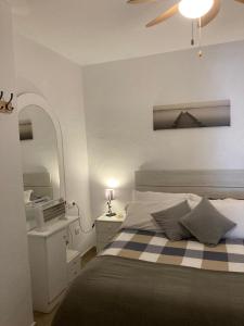 Postel nebo postele na pokoji v ubytování Marina Apartment Beach