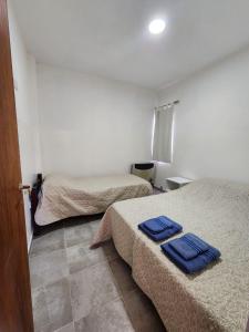 Postel nebo postele na pokoji v ubytování Maipu Alquiler Por Dia