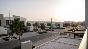 a view of a parking lot in a city at Luxury Villa In Yas in Abu Dhabi