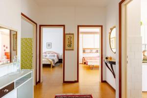 a hallway with two doors and a living room at CasaPiergiulia - Canzo - Lago di Como -Parcheggio - Wifi in Canzo