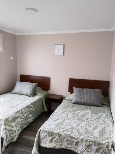 Postel nebo postele na pokoji v ubytování Cabañas San Luis