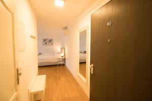 Postel nebo postele na pokoji v ubytování Chic & Central l LF40