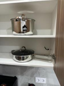 Kuchyň nebo kuchyňský kout v ubytování Airport Buta Legacy + 3 fotografie