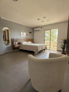 Ένα ή περισσότερα κρεβάτια σε δωμάτιο στο Departamento en San Juan