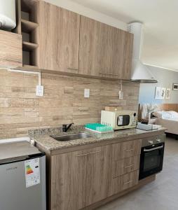 Η κουζίνα ή μικρή κουζίνα στο Departamento en San Juan