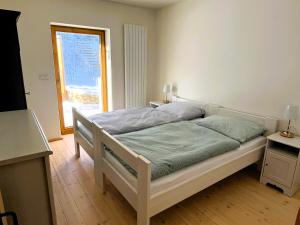 Postel nebo postele na pokoji v ubytování Velká chalupa na Panské