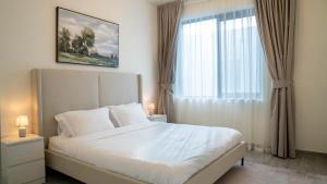 Postel nebo postele na pokoji v ubytování F1 Dream 4br Villa! - Yas Island + 21 fotografií