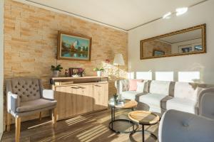 Posezení v ubytování Hotel Beau Rivage
