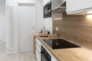 Kuchyň nebo kuchyňský kout v ubytování Casanuova Elegant Apartment & Breakfast + 5 fotografií