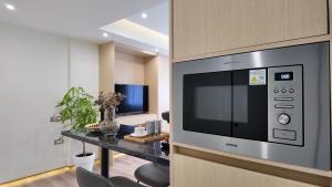 Kuchyň nebo kuchyňský kout v ubytování CC LUX Suites