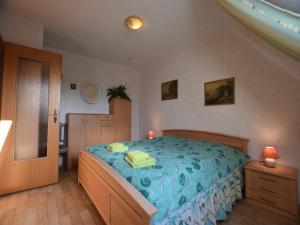 Ein Bett oder Betten in einem Zimmer der Unterkunft Snug Apartment in Kröpelin Germany