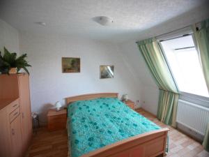 Ein Bett oder Betten in einem Zimmer der Unterkunft Snug Apartment in Kröpelin Germany