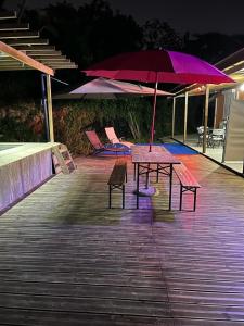 Patio nebo venkovní prostory v ubytování Le Pavillon Ananas