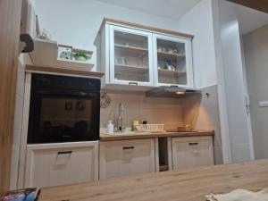 Η κουζίνα ή μικρή κουζίνα στο Apartman Park