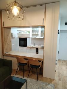 Köök või kööginurk majutusasutuses Apartman Park
