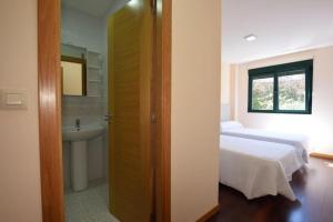 Postel nebo postele na pokoji v ubytování Apartmento Mar O Pindo