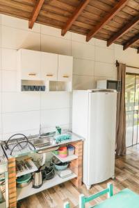 Kuchyň nebo kuchyňský kout v ubytování Casa completa no segundo andar