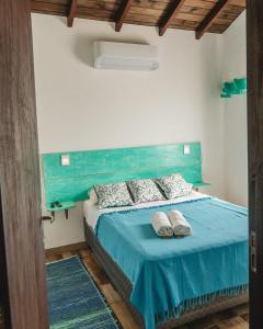 Postel nebo postele na pokoji v ubytování Casa completa no segundo andar