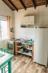 Kuchyň nebo kuchyňský kout v ubytování Casa completa no segundo andar