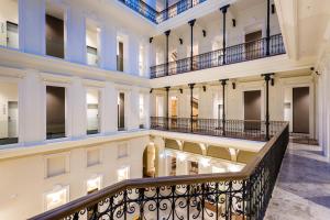 a view from the second floor of a building with a staircase at Hotel Moments Budapest in Budapest