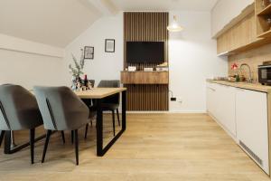 Kuchyň nebo kuchyňský kout v ubytování Apartman Nina