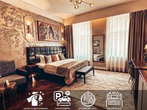 Posteľ alebo postele v izbe v ubytovaní Alfons Boutique Hotel