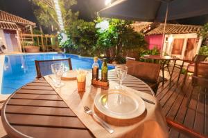 A piscina localizada em Hotel Pousada Coqueiros ou nos arredores