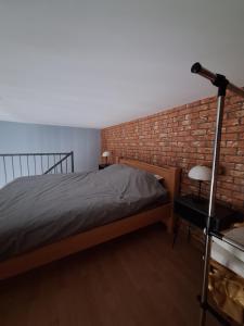 Katil atau katil-katil dalam bilik di Apartman Duga