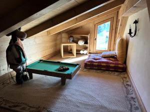 a room with a pool table and a couch at Chalet Medonnet - CHALET 10 personnes Combloux MAE-7241 in Combloux
