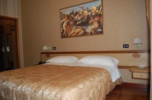 Postel nebo postele na pokoji v ubytování Hotel Ristorante Donato