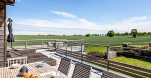 En balkon eller terrasse på Villa d'architecte piscine intérieure 12 personnes