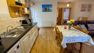 A kitchen or kitchenette at Skellig View Sunset Cliffs View Apartment
