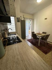 Kuchyň nebo kuchyňský kout v ubytování Coco apartment