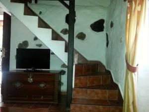 Μια τηλεόραση ή/και κέντρο ψυχαγωγίας στο Casa Rural Los abuelos, El Hierro, Frontera