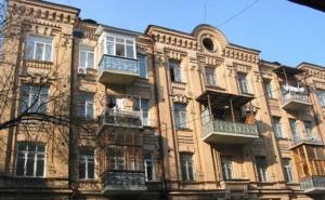 a large building with balconies on the side of it at Yourhostel Olimpiyskiy in Kyiv